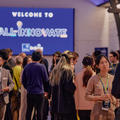 Attendees networking at a startup event