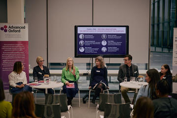 Panellists deep in discussion during an event