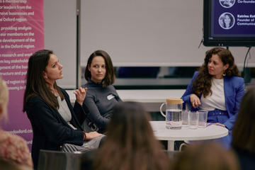Panellists deep in discussion during an event