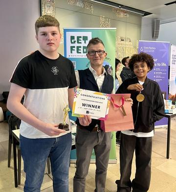 second place 2024 demo night winners, Get Fed, with their prizes