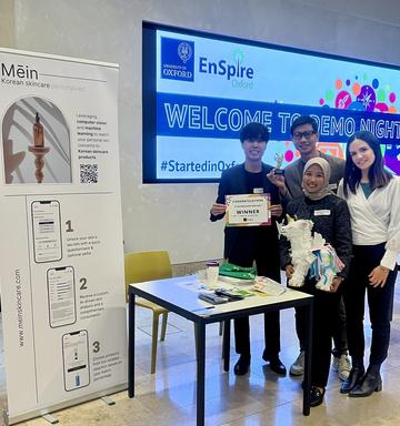 first place 2024 demo night winners, Mein Skincare, with their prizes