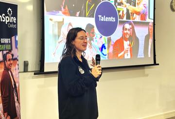 Person pitching at an event
