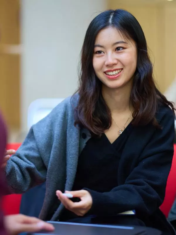 STUDENTS SITTING IN THE STEPHEN A. SCHWARZMAN CENTRE FOR THE HUMANITIES'S GREAT HALL