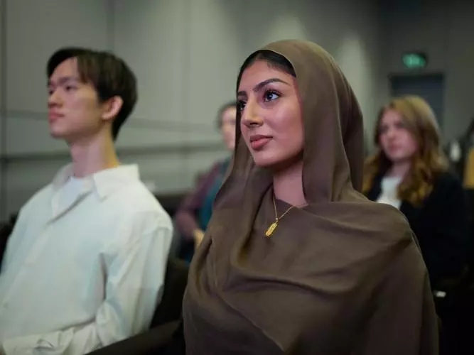  STUDENTS WATCH A PRESENTATION IN THE STEPHEN A. SCHWARZMAN CENTRE FOR THE HUMANITIES
