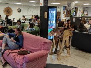 Interior of common ground cafe showing people sitting and talking