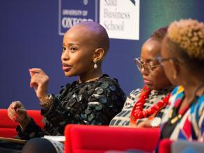 Three women taking part in a panel discussion at Oxford Business Forum Africa